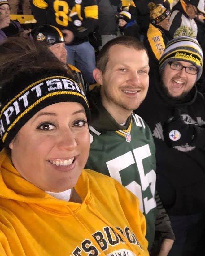 Ben with friends, Emily and Brad in the stands of Heinz Field